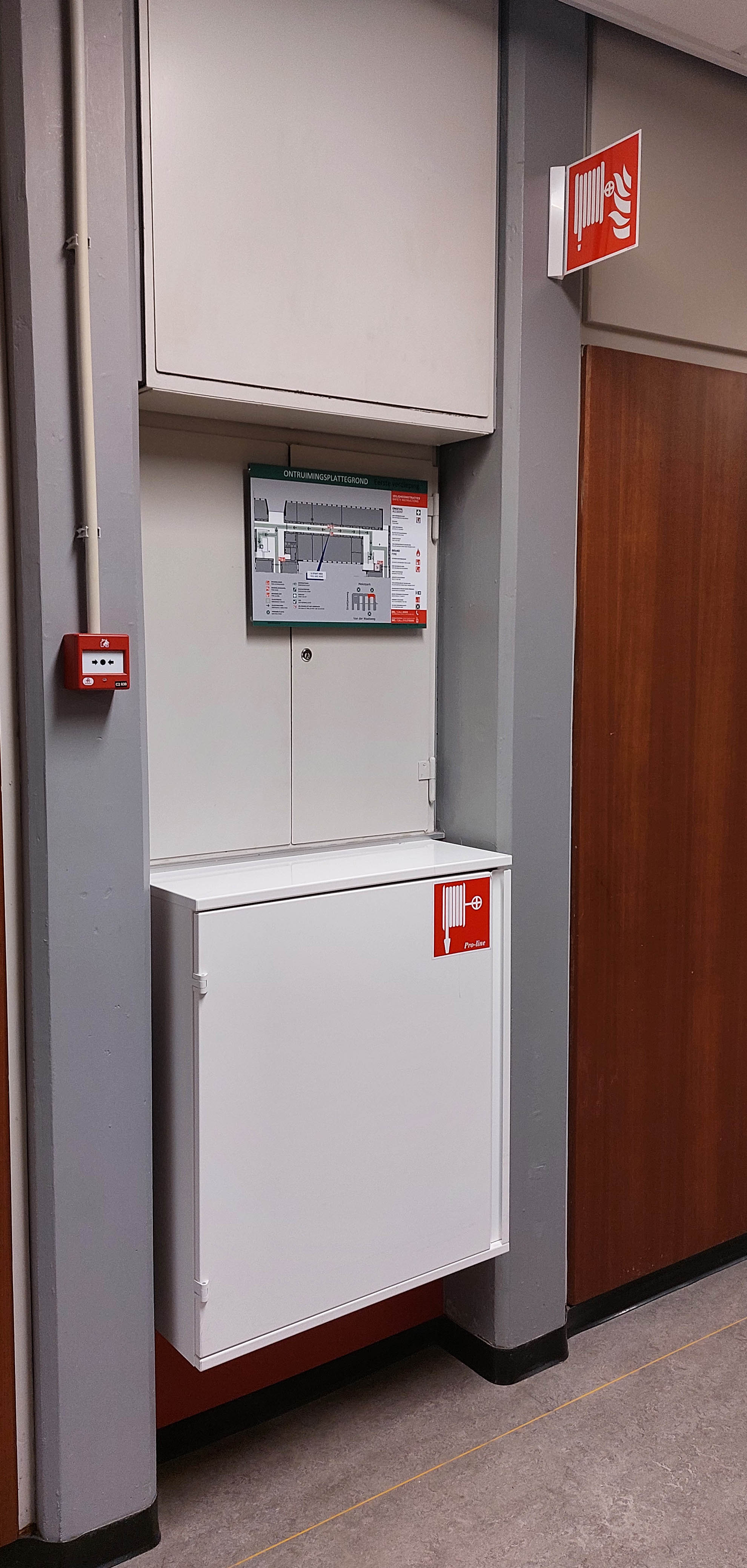 At several places one clearly indicated signs of fire extinguishers, and alarms.